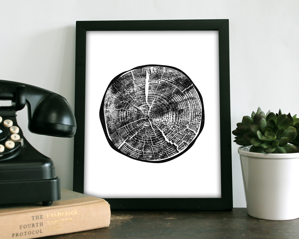Flat vector illustration on a stark black-and-white background: a grid of stacked greeting cards and art prints in saturated yellow, white, and black, surrounded by thin geometric line patterns and diagrammatic blocks suggesting a poster layout.